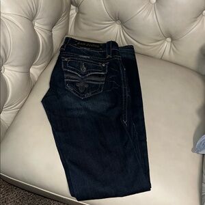 SOLD***Rock Revival Indigo Jeans with Vibrant Orange Accents